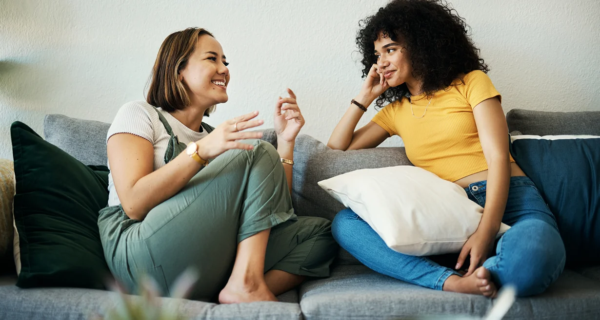 Friends talking on a couch